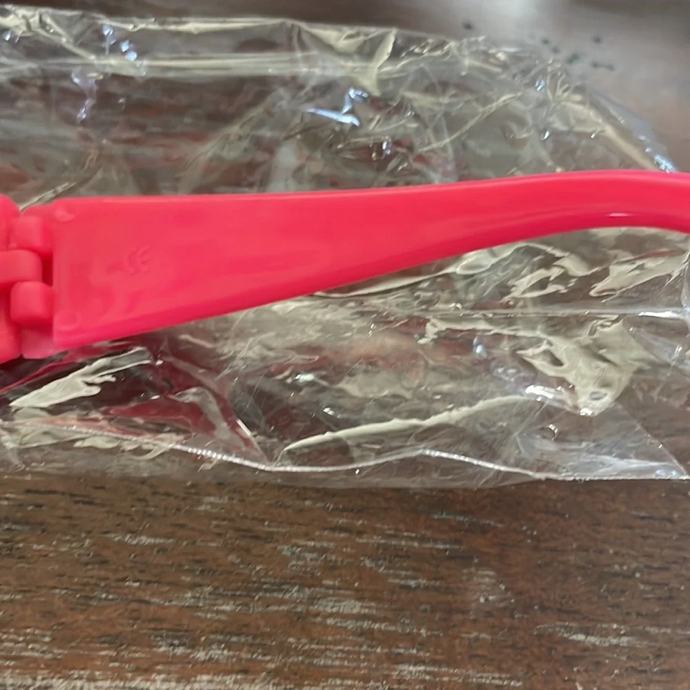 Kids hot pink sunglasses IOP